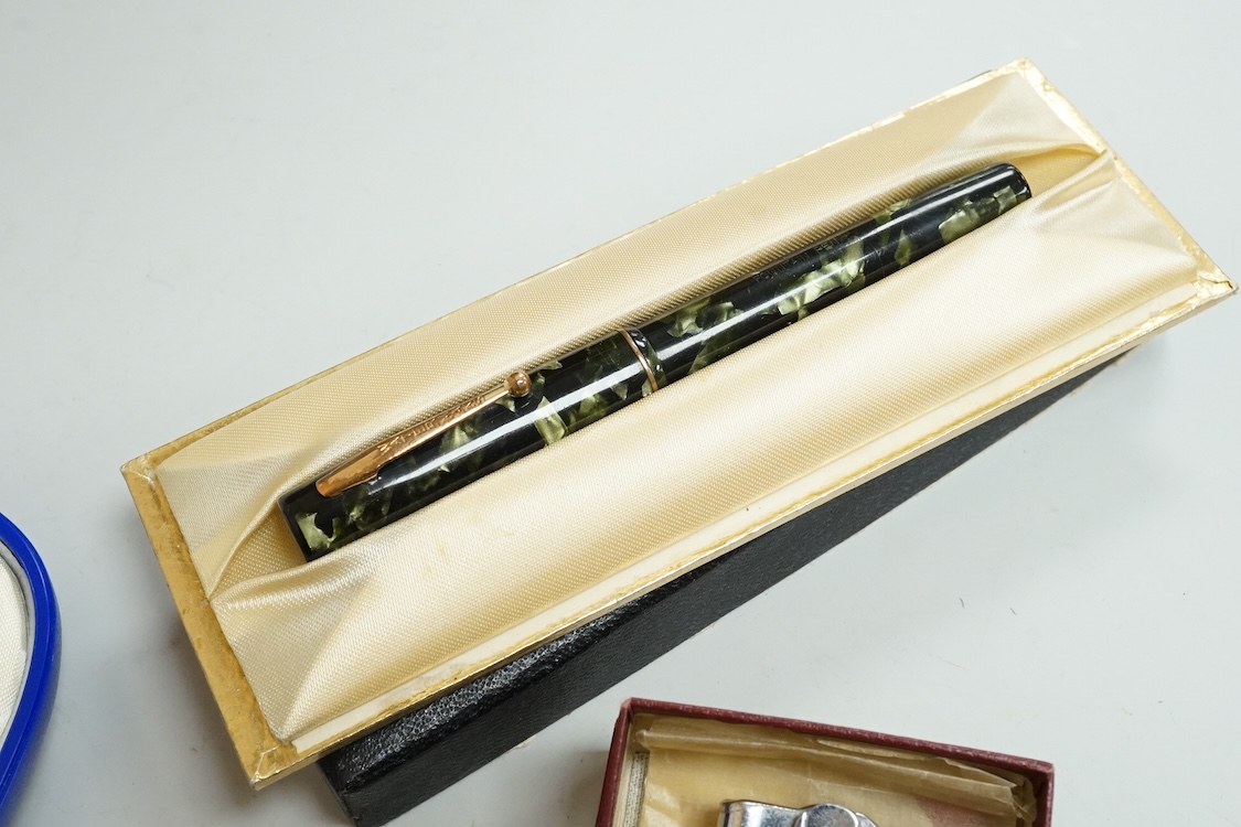 A cased Messenger pen and pencil set, a Waterman pen, etc.